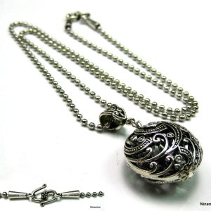 Collier mi long pendentif boule filigrané métal argent